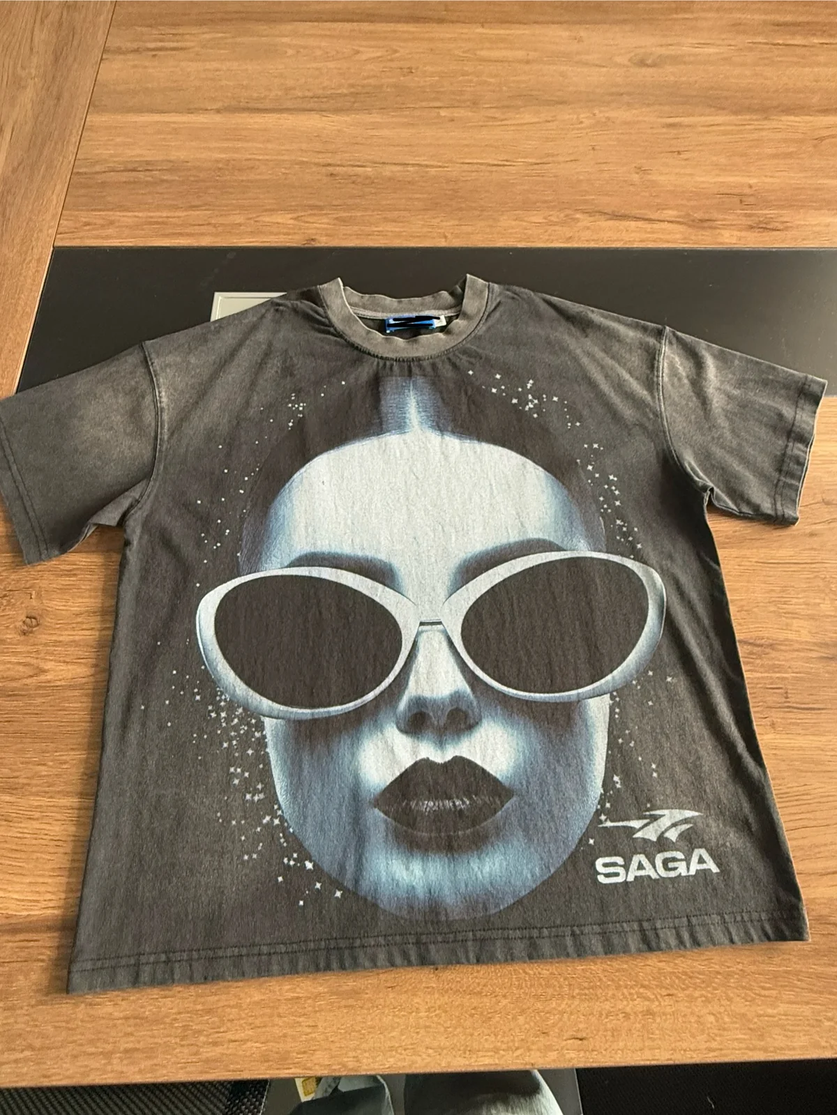 Detailed tonal DTG graphic on a washed charcoal T-shirt reference