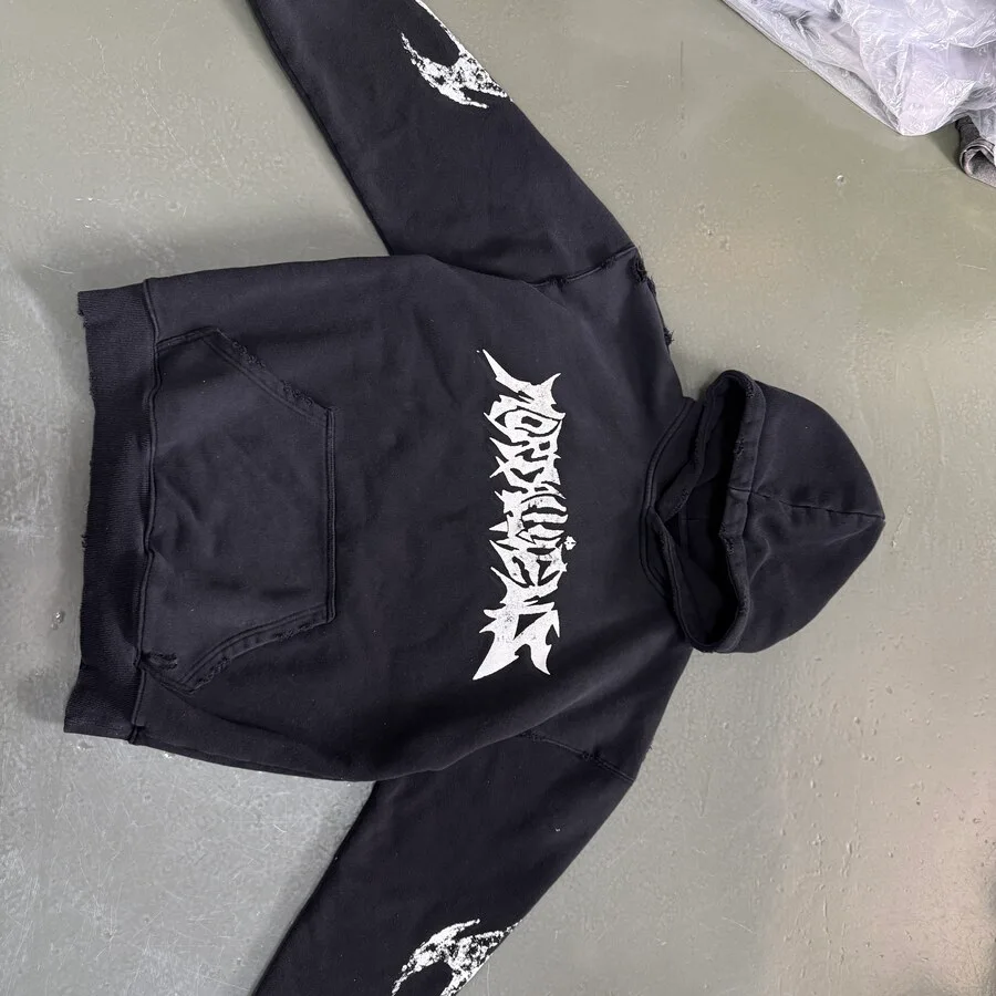 Black custom hoodie sample with sleeve artwork
