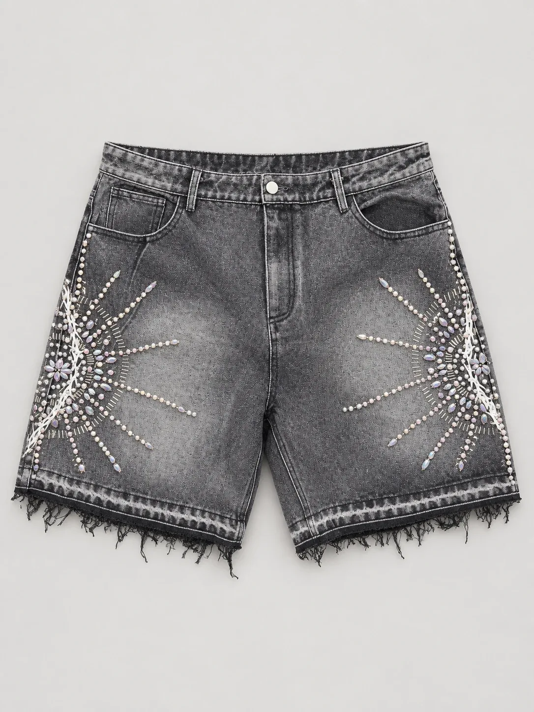 Grey denim shorts with decorative stones, stitched motifs and frayed hems
