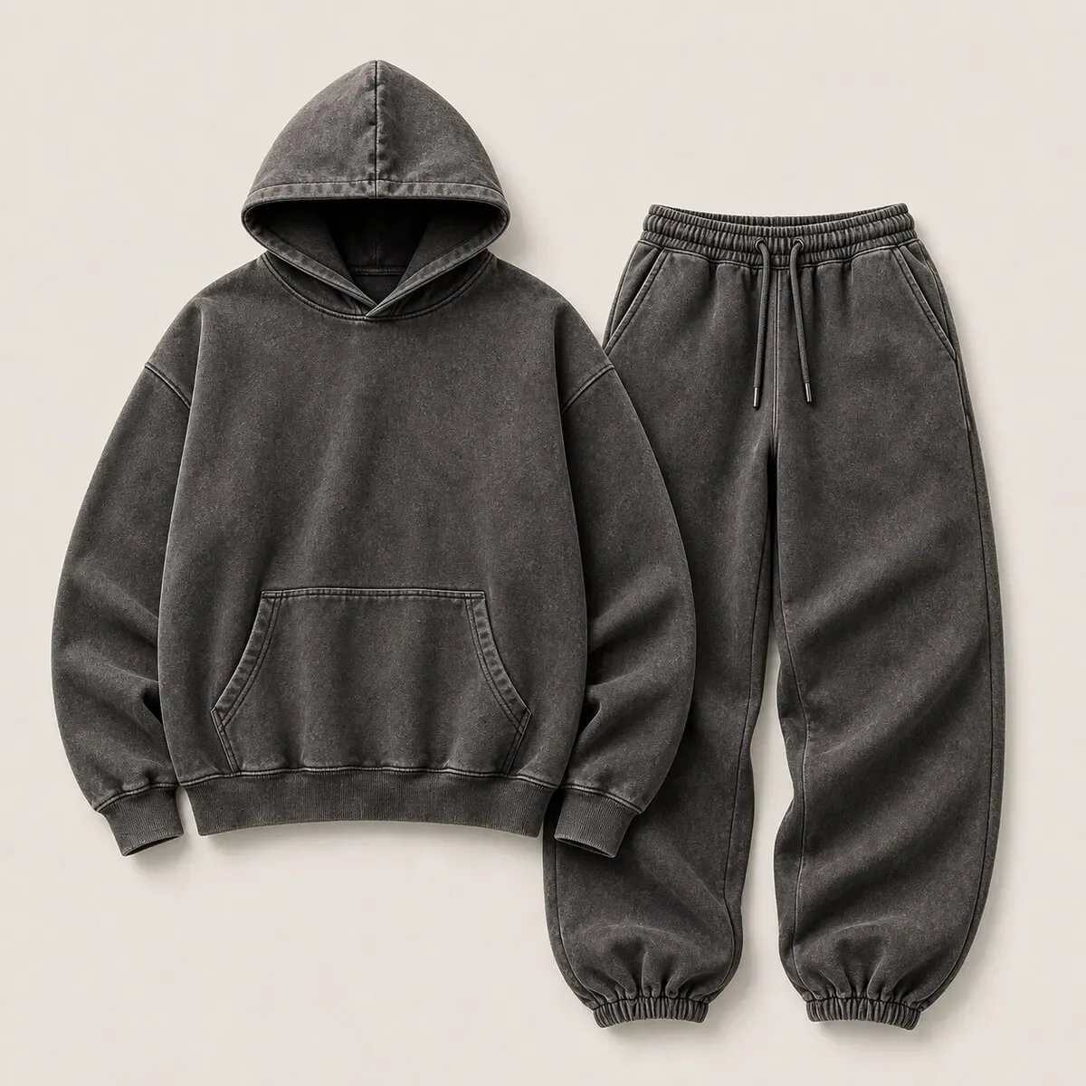 Coordinated charcoal hoodie and jogger styling reference