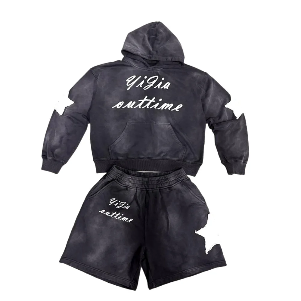 Dark hoodie and shorts set with matching artwork