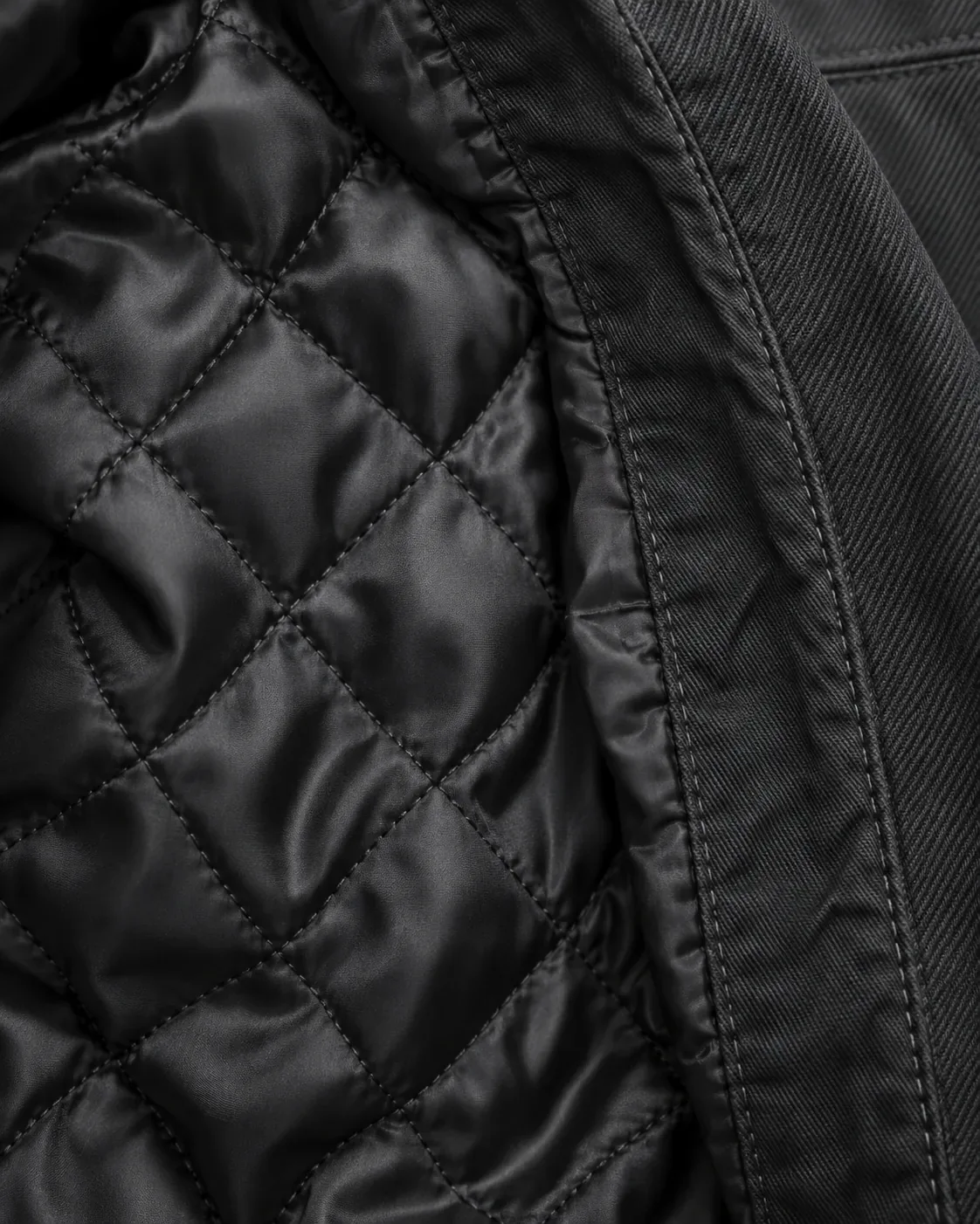 Quilted satin lining inside an open jacket